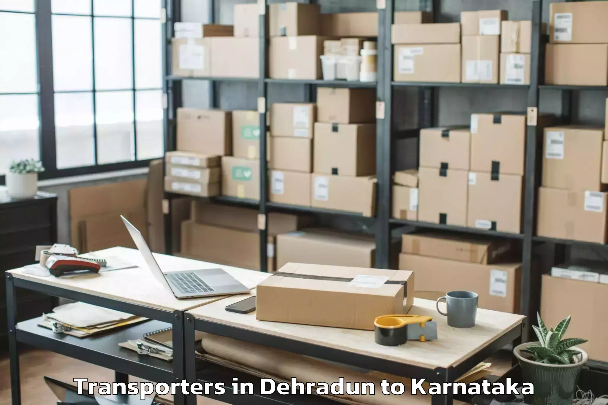 Book Dehradun to Ponnampet Transporters Online